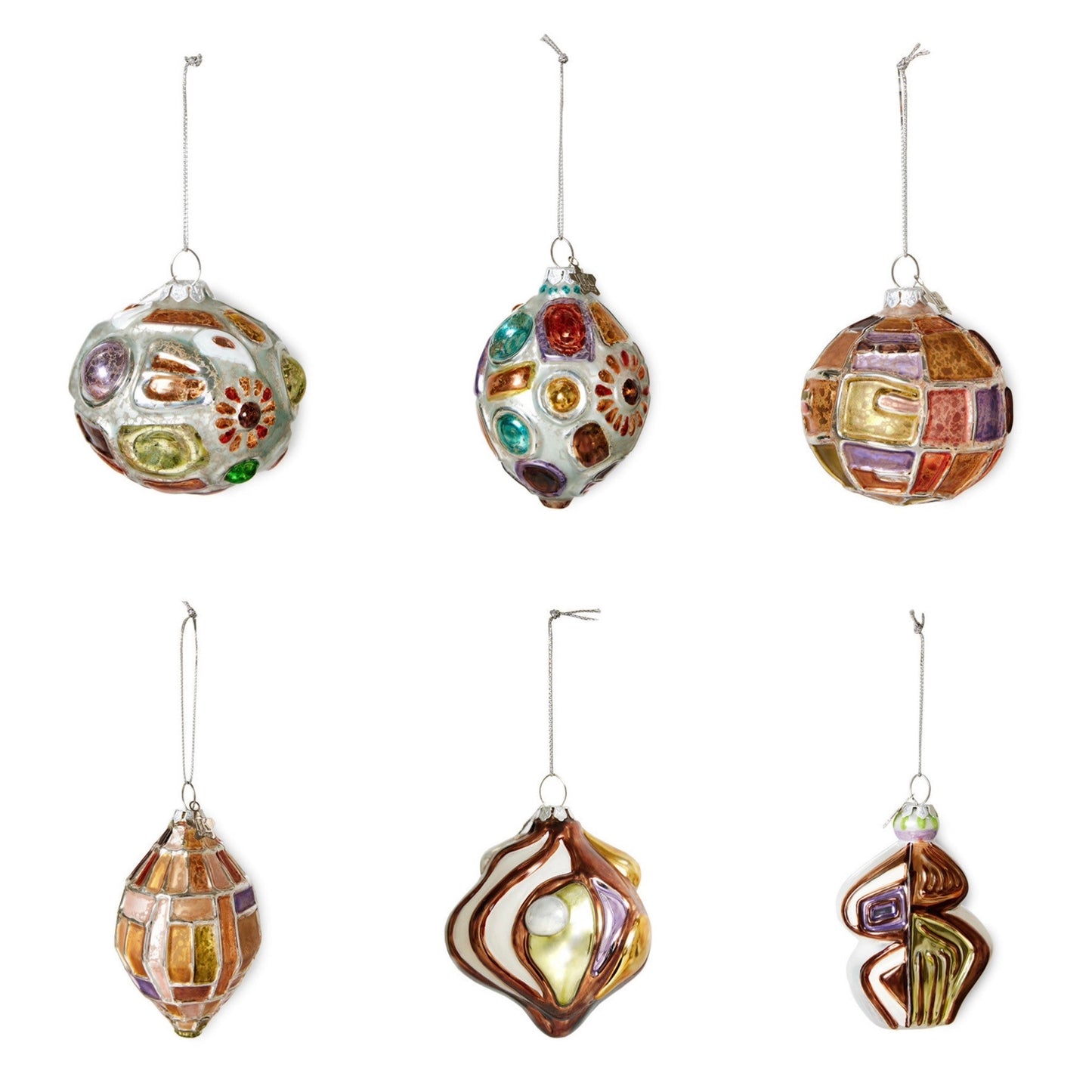 Set of colorful glass ornaments on a white background