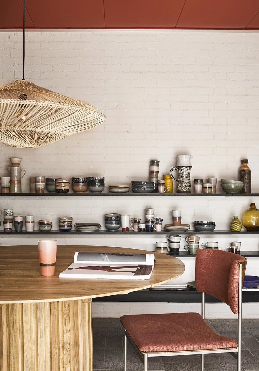 teak wooden dining table in Mid Century Modern Setting