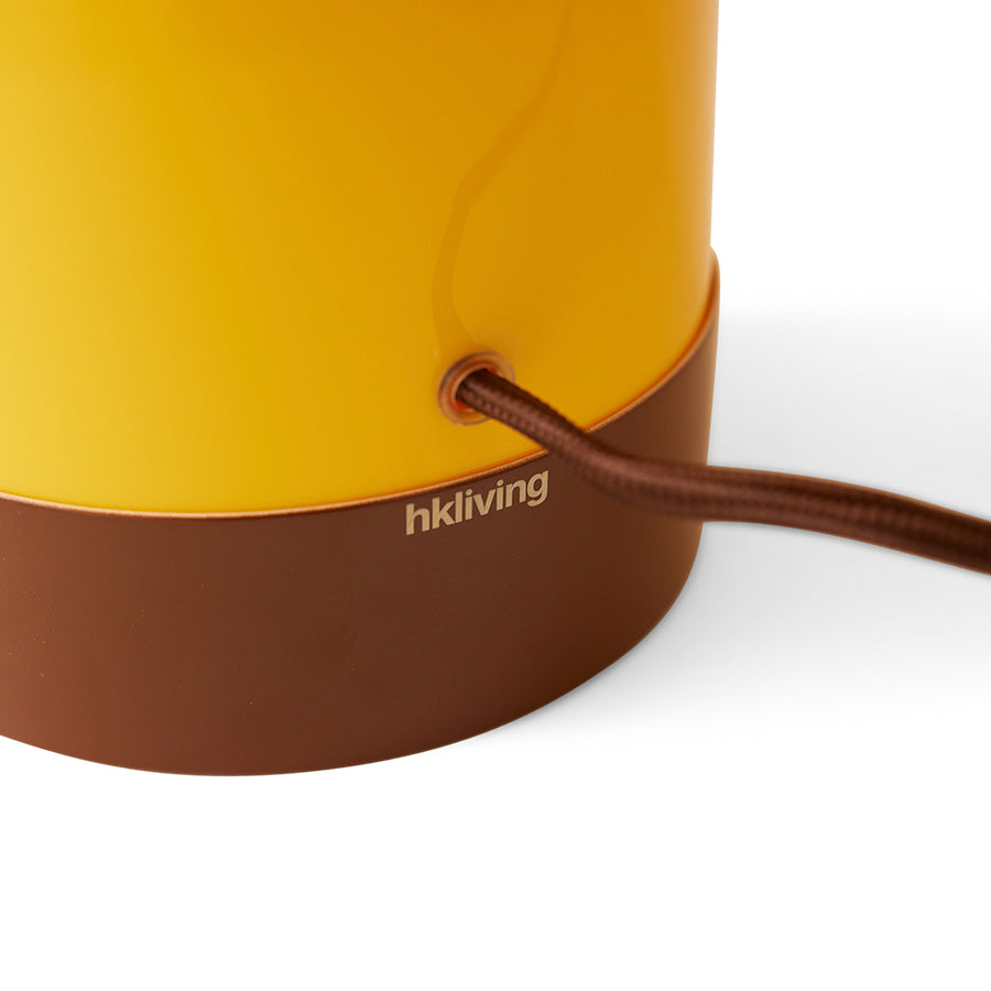 Yellow and brown lamp with 'hkliving' branding on a white background