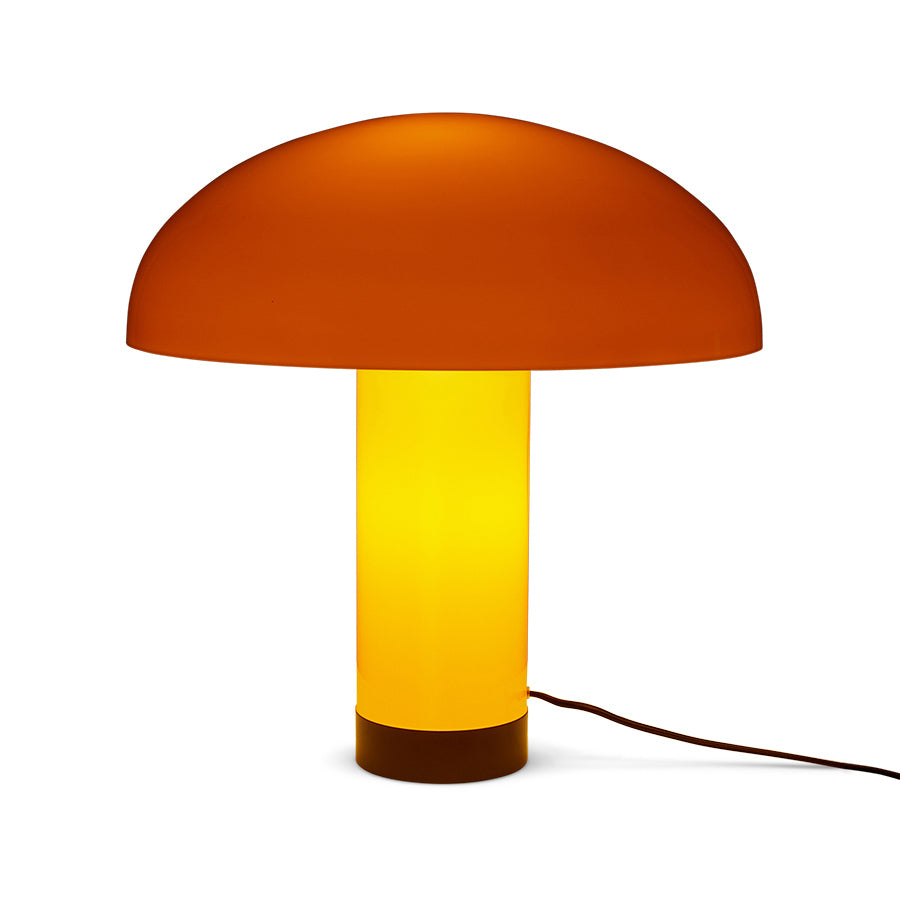 Mushroom-shaped table lamp with orange top and yellow base on a white background
